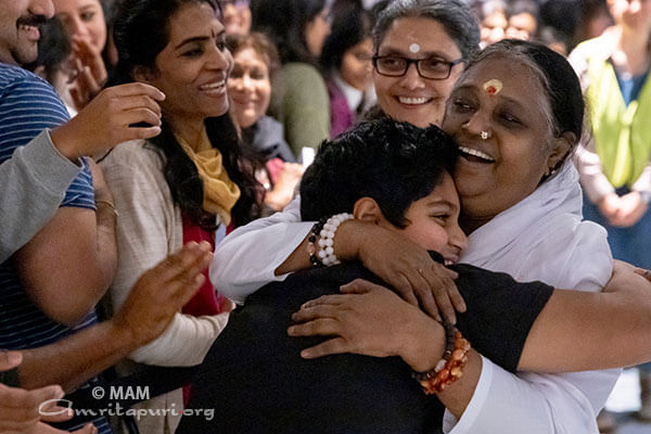 Amma hugging a boy